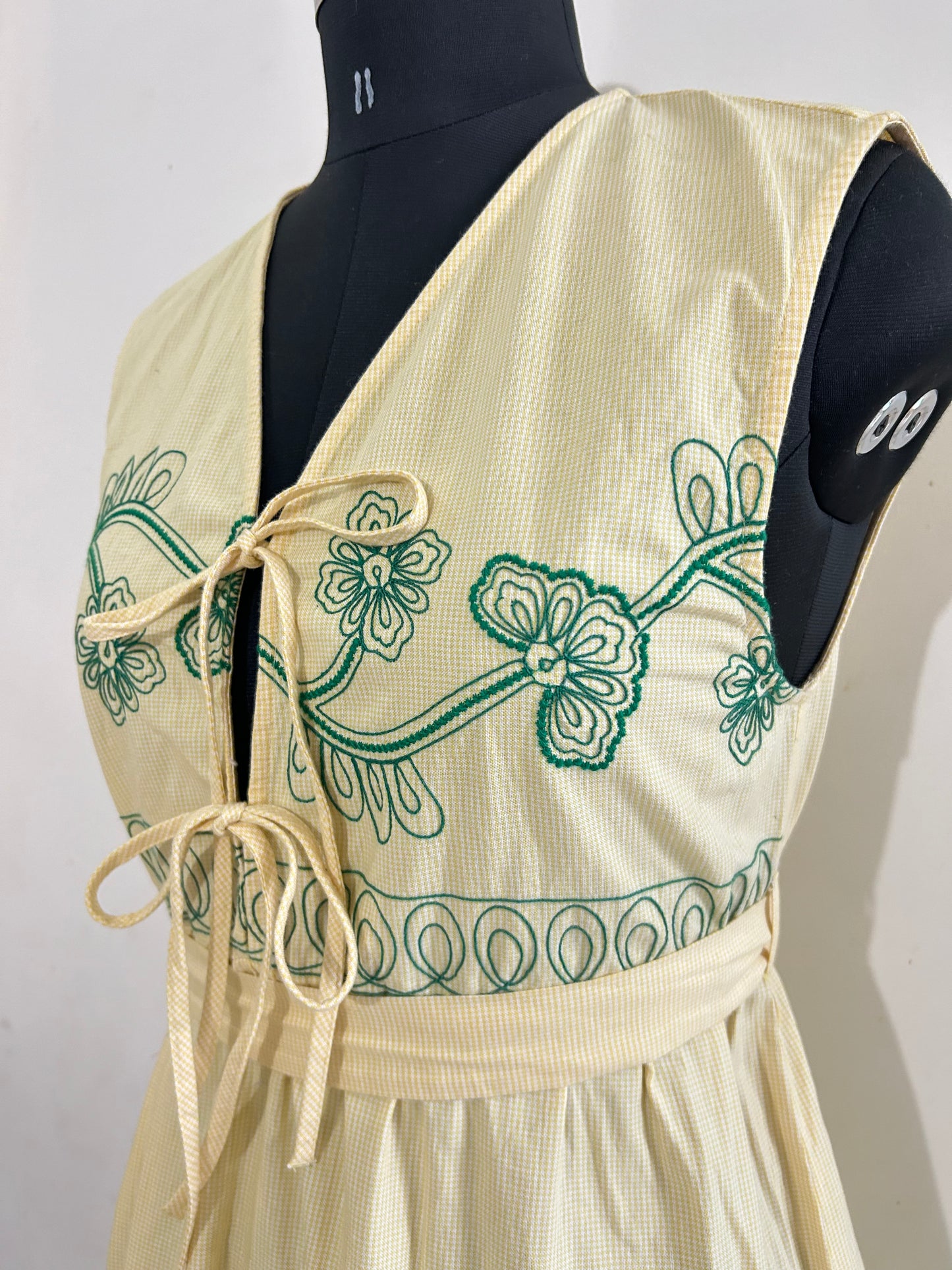 Cotton dress with green embroidery