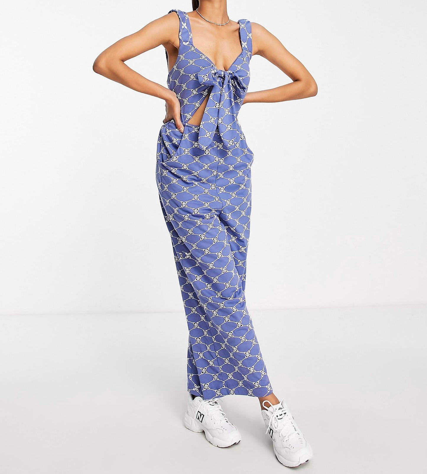 ASOS DESIGN jersey eyelet elasticated back jumpsuit in blue