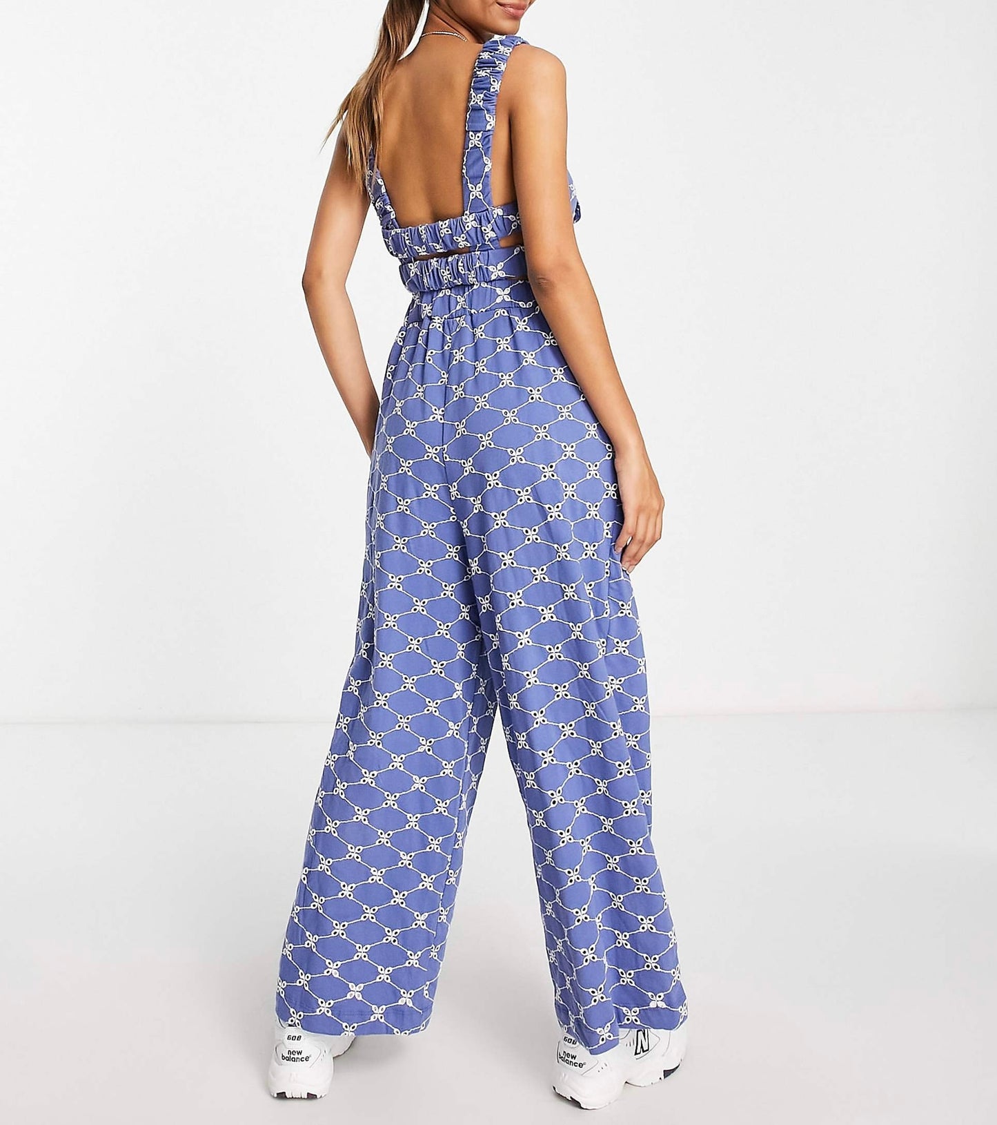 ASOS DESIGN jersey eyelet elasticated back jumpsuit in blue