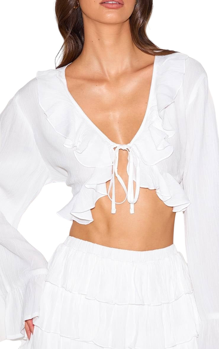 PrettyLittleThing cheesecloth ruffle tie front long sleeve:44”