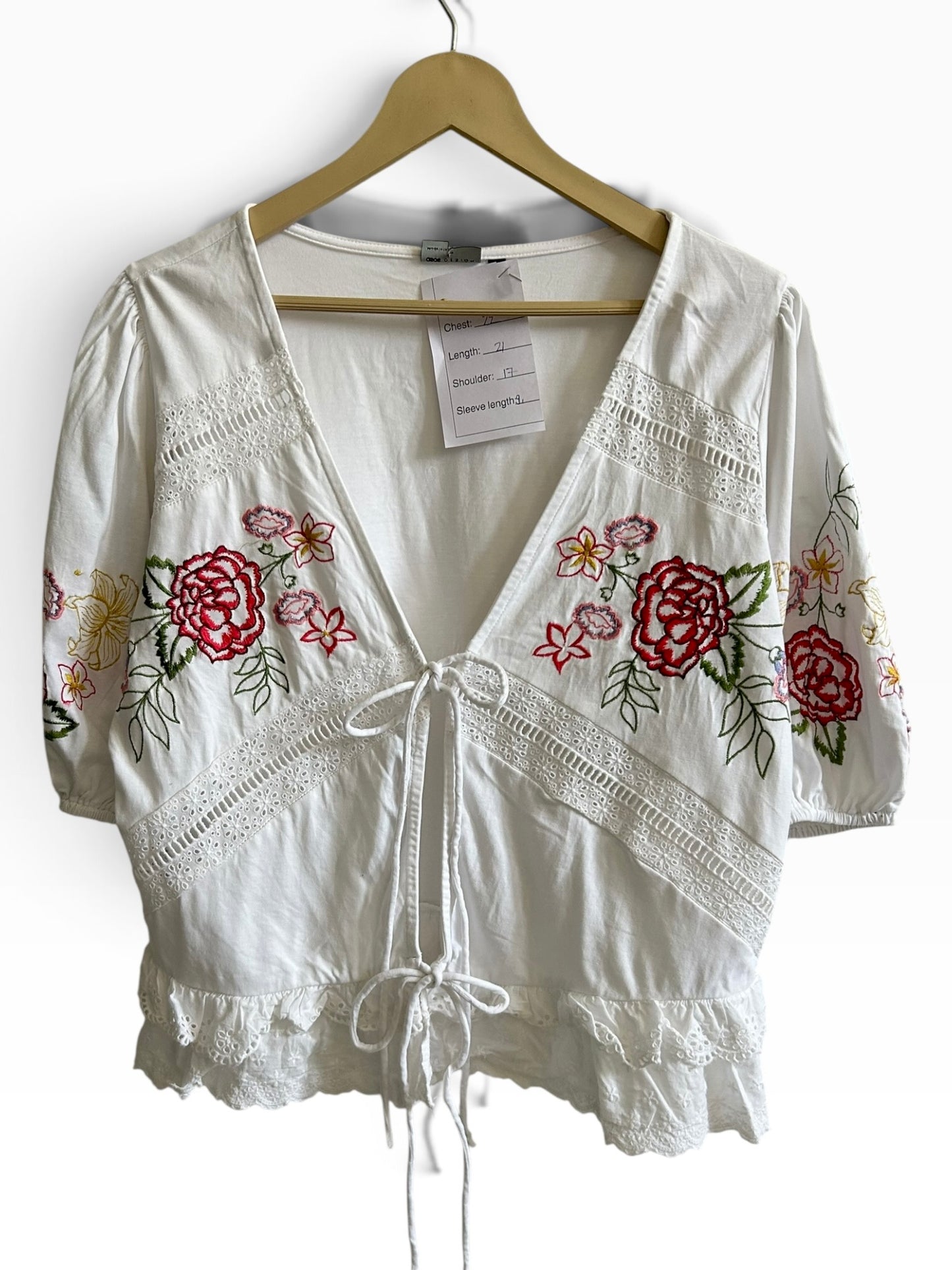 ASOS DESIGN tie front top with floral embroidery