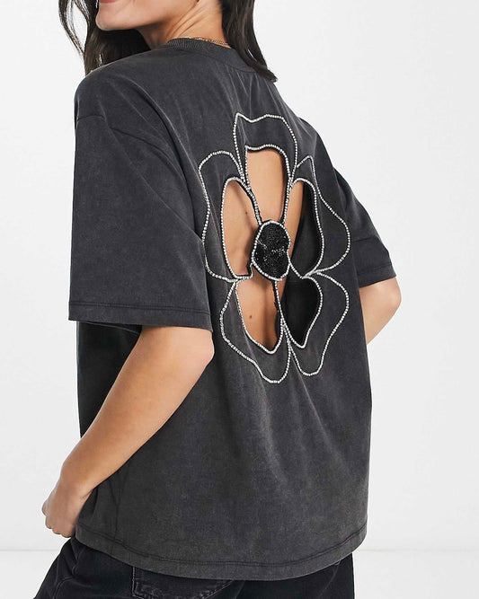 ASOS DESIGN boxy t-shirt with cut out diamante flower in washed charcoal