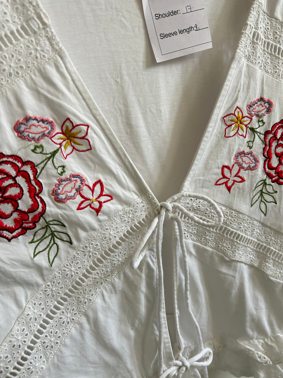ASOS DESIGN tie front top with floral embroidery