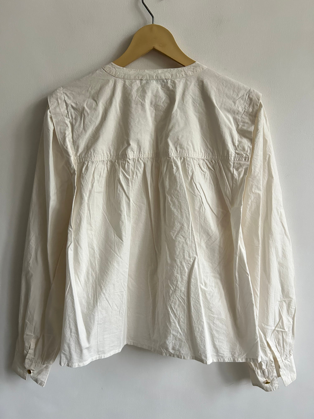 Embroidered White Top: