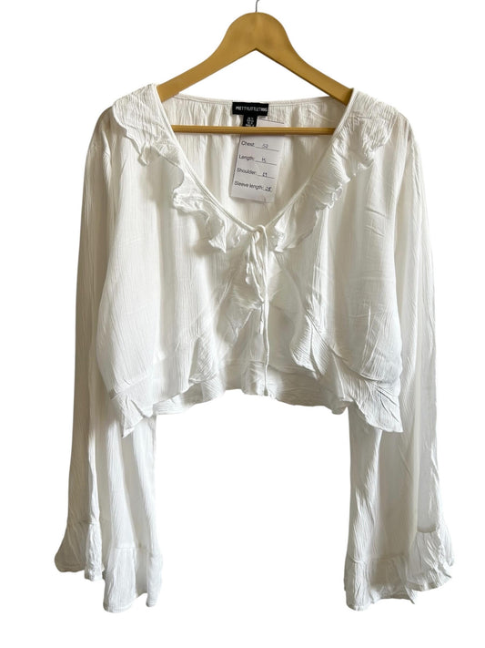 PrettyLittleThing cheesecloth ruffle tie front long sleeve: 52”