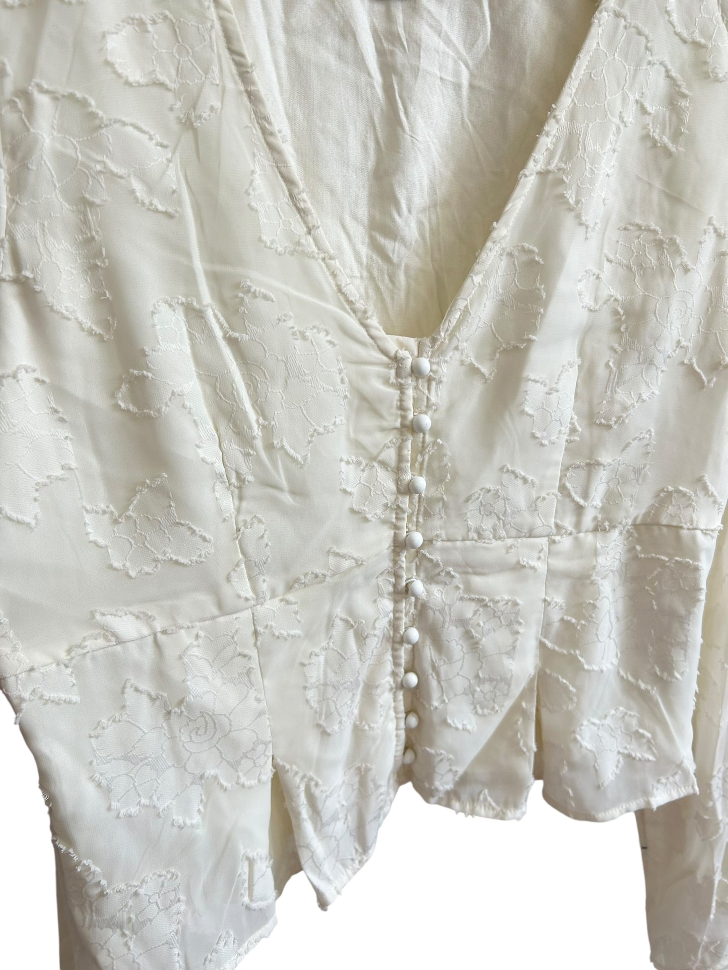 BOOHOO floral textured button down blouse features statement bell sleeves