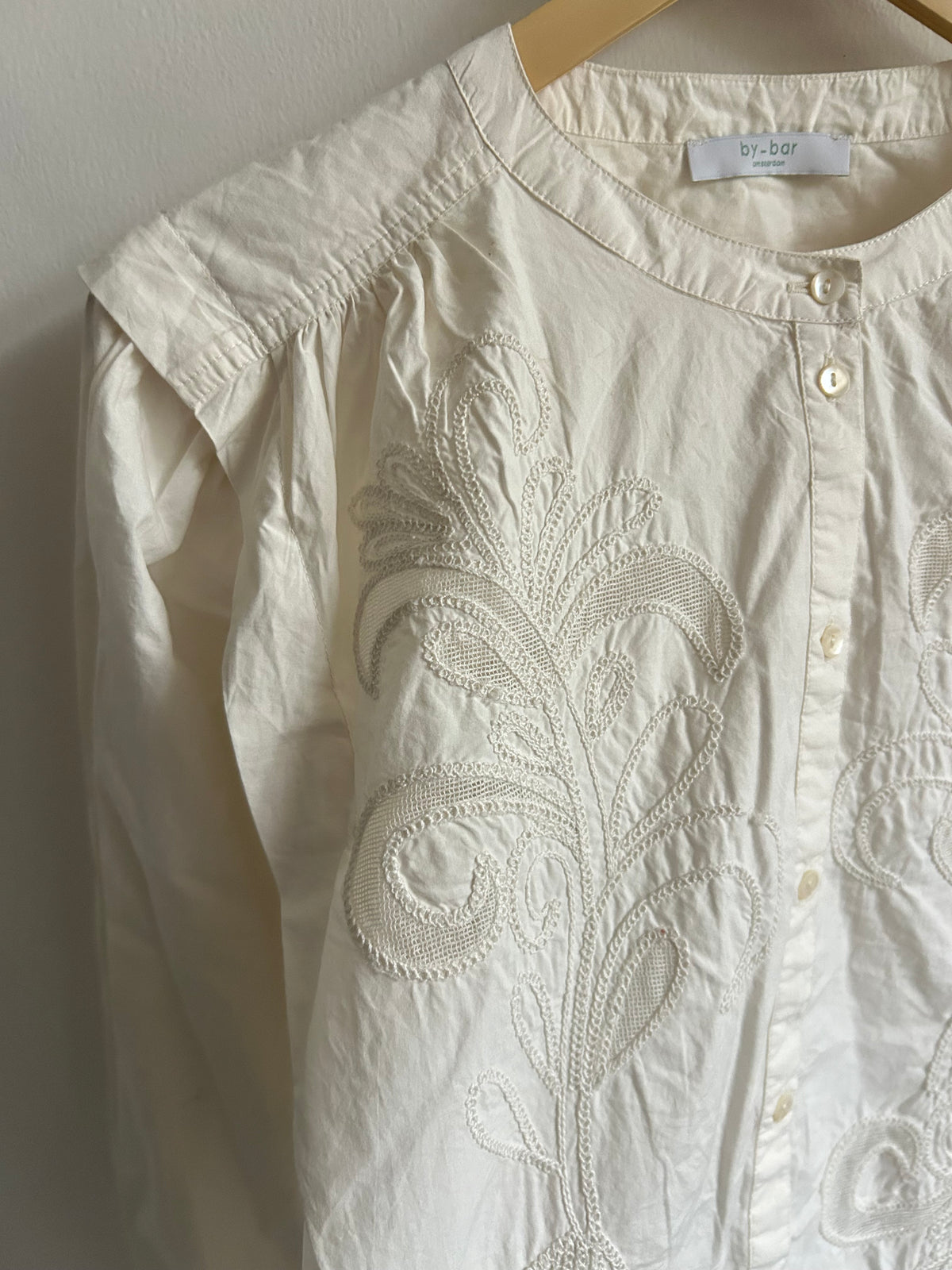 Embroidered White Top: